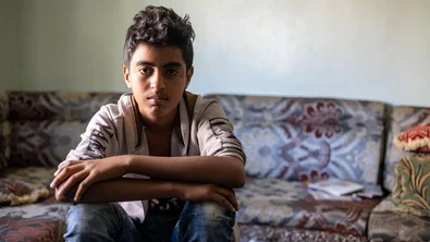 CH1659680-Isaac-14-at-his-home-recovering-after-being-shot-by-a-sniper-while-playing-football-outside-his-school.jpg
