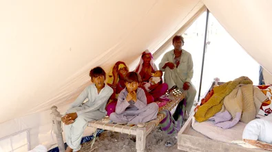 CH1723119-Guddi-s-family-living-in-a-makeshift-tent-provided-by-Save-the-Children-Sindh.JPG