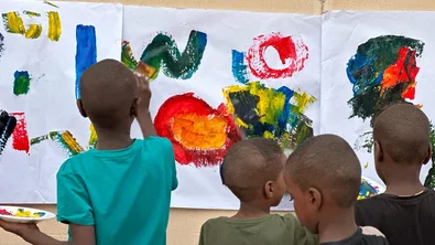 CH1815403-Children-from-Sudan-participate-in-craft-activities-at-the-bus-station-1.jpeg