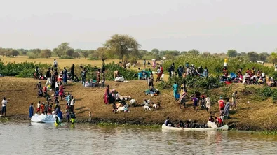 Families fleeing to the river bank in Akobo South Sudan
