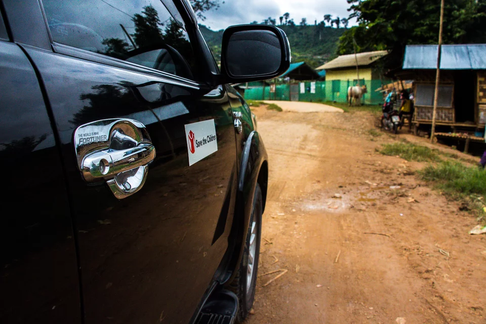 CH127196-A-Save-The-Children-vehicle-at-the-Umphiem-Camp-located-in-Mae-Sot-Thailand CH127196-A-Save-The-Children-vehicle-at-the-Umphiem-Camp-located-in-Mae-Sot-Thailand