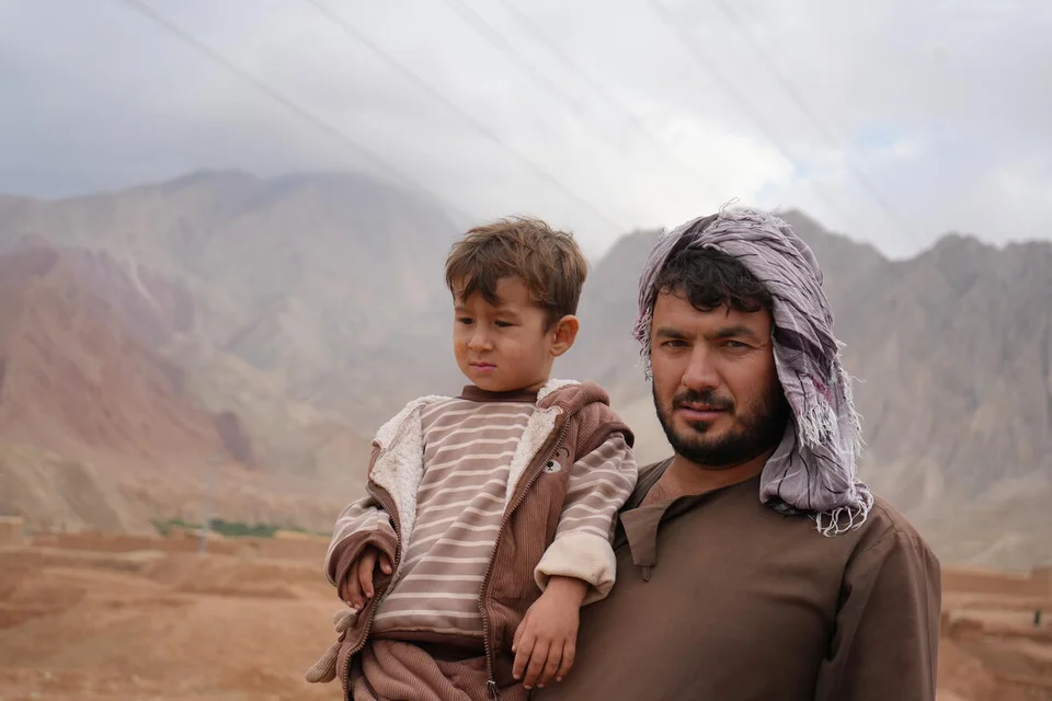 Farid with his child
