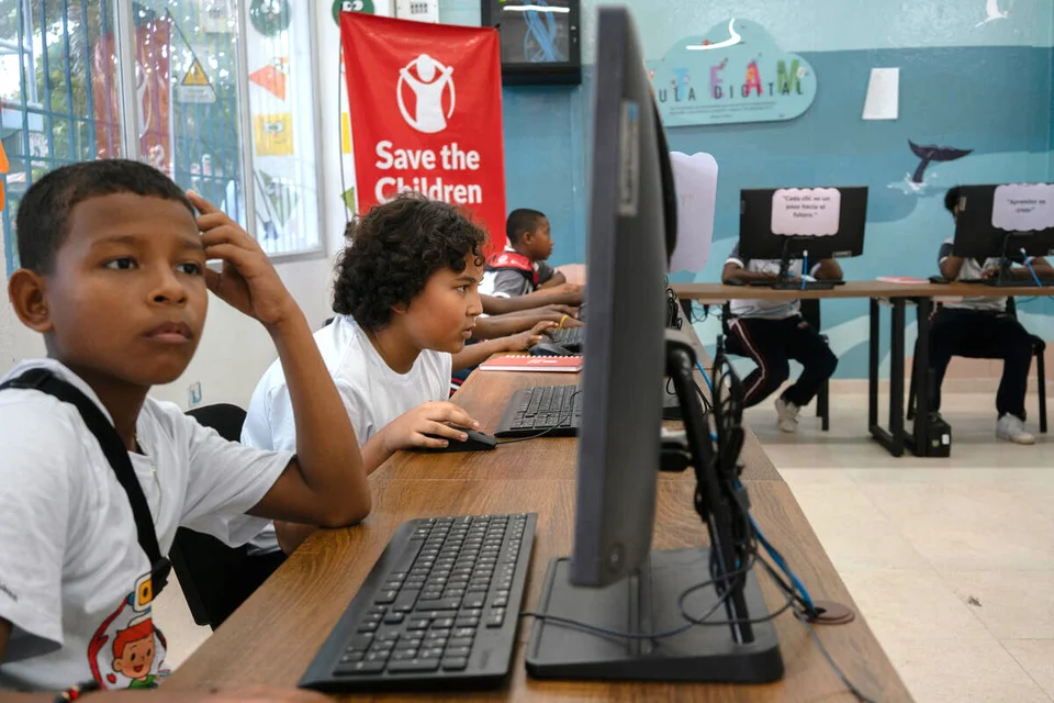 Leerlingen aan het werk met computers