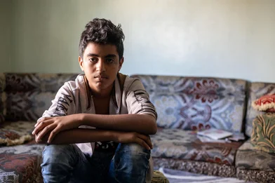 CH1659680-Isaac-14-at-his-home-recovering-after-being-shot-by-a-sniper-while-playing-football-outside-his-school.jpg