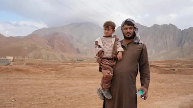 Farid with his child Mohamad